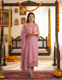 Heavy Pure Chinon Silk Embroidered 3-Piece Suit Set featuring a richly embroidered kurta, matching pure silk bottoms, and a complementary dupatta, showcasing intricate threadwork and luxurious fabric texture.