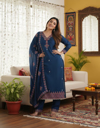 Heavy Pure Chinon Silk Embroidered 3-Piece Suit Set featuring a richly embroidered kurta, matching pure silk bottoms, and a complementary dupatta, showcasing intricate threadwork and luxurious fabric texture.