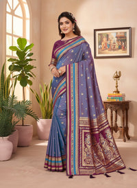 Elegantly draped Pure Handloom Kalamkari Silk Saree with intricate hand-painted motifs and a shimmering gold Zari border on luxurious silk.