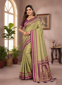 Elegantly draped Pure Handloom Kalamkari Silk Saree with intricate hand-painted motifs and a shimmering gold Zari border on luxurious silk.