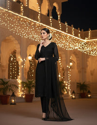 Front view of an elegant Salwar Kameez featuring intricate tonal embroidery and delicate scalloped lace detailing.