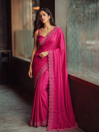 Full-length view of a model draped in a Luxe Hollywood Satin Saree with a complementary Banglori blouse featuring intricate running Jarkan lace.