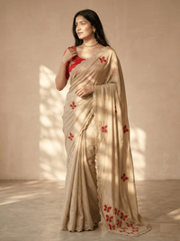 Close-up of an elegant butterfly handwork saree with intricate embroidery details, showcased on a mannequin.