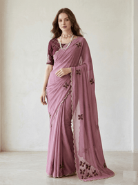 Close-up of an elegant butterfly handwork saree with intricate embroidery details, showcased on a mannequin.