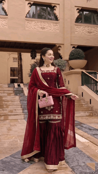Model in full designer sequin Jimmy Choo palazzo set and elegant crancy dupatta, showcasing luxury party wear.