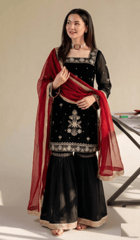 Model in full designer sequin Jimmy Choo palazzo set and elegant crancy dupatta, showcasing luxury party wear.