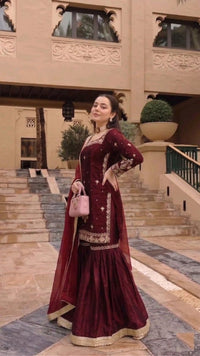 Model in full designer sequin Jimmy Choo palazzo set and elegant crancy dupatta, showcasing luxury party wear.