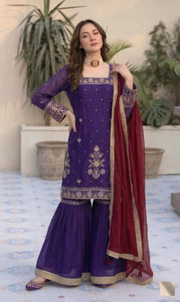 Model in full designer sequin Jimmy Choo palazzo set and elegant crancy dupatta, showcasing luxury party wear.