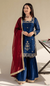 Model in full designer sequin Jimmy Choo palazzo set and elegant crancy dupatta, showcasing luxury party wear.