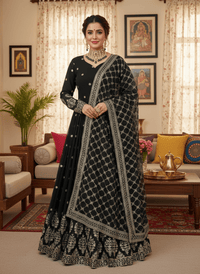 Elegant embroidered sequence designer Anarkali suit with heavy work on blouse, flowing silhouette, and faux georgette dupatta.