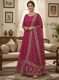 Elegant embroidered sequence designer Anarkali suit with heavy work on blouse, flowing silhouette, and faux georgette dupatta.