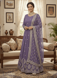 Elegant embroidered sequence designer Anarkali suit with heavy work on blouse, flowing silhouette, and faux georgette dupatta.