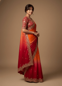Fendy Satin Space Silk Saree featuring intricate embroidery work and elegant lace border