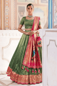 Elegant Simmer Organza Lehenga with ornate zari weaving work and a delicate lace border detail