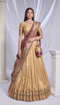 Elegant Simmer Organza Lehenga with ornate zari weaving work and a delicate lace border detail