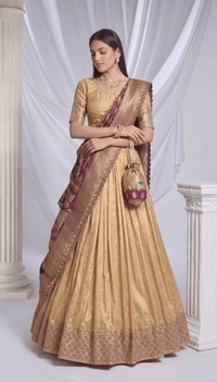 Elegant Simmer Organza Lehenga with ornate zari weaving work and a delicate lace border detail
