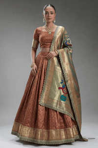 Elegant Simmer Organza Lehenga with ornate zari weaving work and a delicate lace border detail