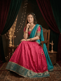 Elegant Vichitra Silk Lehenga with intricate zari embroidery, delicate lace border, and matching dupatta