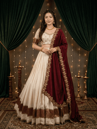 Elegant Vichitra Silk Lehenga with intricate zari embroidery, delicate lace border, and matching dupatta