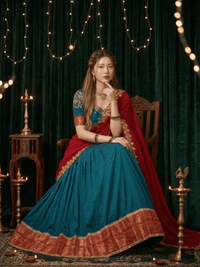 Elegant Vichitra Silk Lehenga with intricate zari embroidery, delicate lace border, and matching dupatta